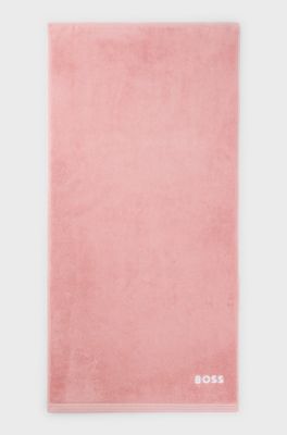 Cotton hand towel with contrast embroidered logo, light pink