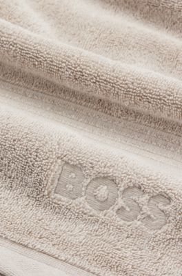 Handtuch aus Baumwolle mit Logo-Stickerei, Hellbeige