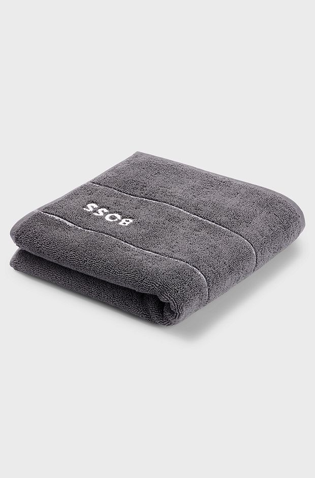 Cotton hand towel with white logo embroidery, Dark Grey