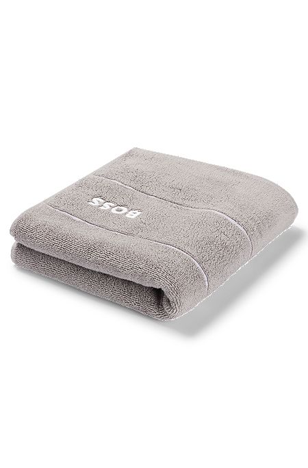 Cotton hand towel with white logo embroidery, Grey