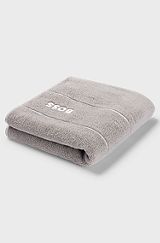 Cotton hand towel with white logo embroidery, Grey