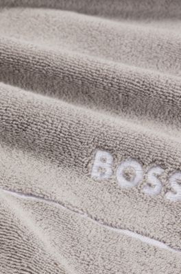 Cotton hand towel with white logo embroidery, Grey