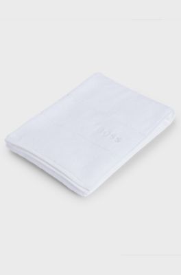 Serviette de toilette en coton avec logo blanc brod&eacute;, Blanc