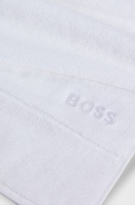 Serviette de toilette en coton avec logo blanc brod&eacute;, Blanc