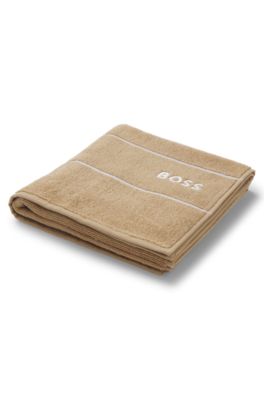 Cotton hand towel with white logo embroidery, Beige