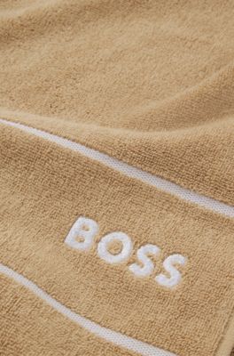 Cotton hand towel with white logo embroidery, Beige