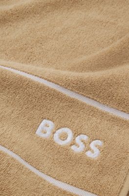 Cotton hand towel with white logo embroidery, Beige