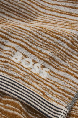 Jacquard-pattern hand towel in cotton velvet, Orange