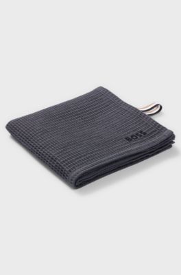 Honeycomb-cotton hand towel with signature-stripe strap, Dark Grey