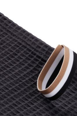 Honeycomb-cotton hand towel with signature-stripe strap, Dark Grey