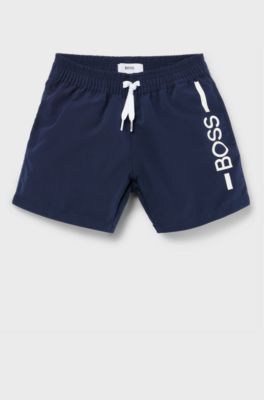 Kids' quick-drying swim shorts with stripe and logo, Dark Blue