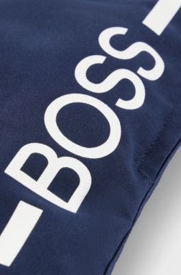 Kids' quick-drying swim shorts with stripe and logo, Dark Blue