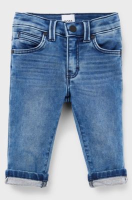 Jeans per bambini in denim elasticizzato con tasca posteriore brandizzata, Blu