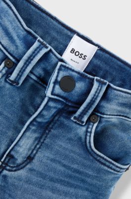 Jeans per bambini in denim elasticizzato con tasca posteriore brandizzata, Blu