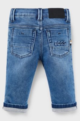 Jeans per bambini in denim elasticizzato con tasca posteriore brandizzata, Blu