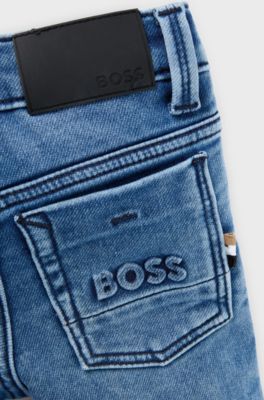 Jeans per bambini in denim elasticizzato con tasca posteriore brandizzata, Blu