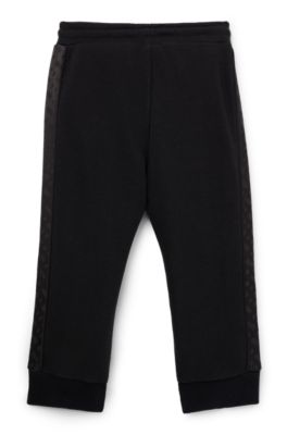 Kids' cotton-blend tracksuit bottoms with monogram inserts, Black