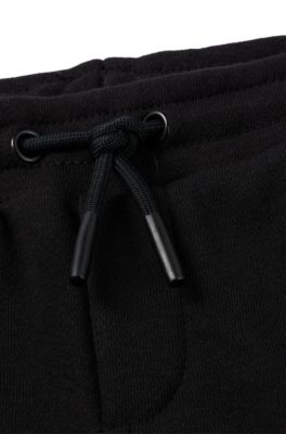 Kids' cotton-blend tracksuit bottoms with monogram inserts, Black