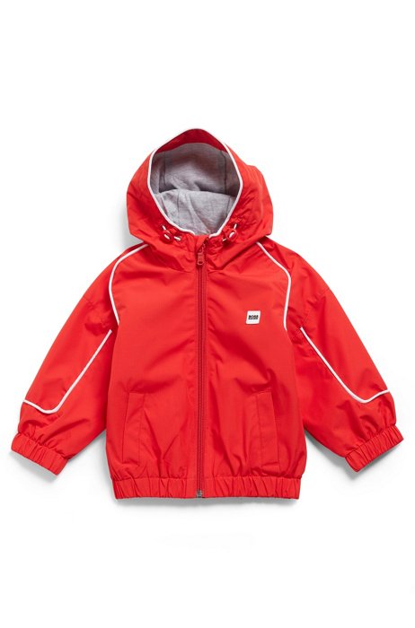 Cazadora cortavientos con capucha para niños en tejido impermeable con logo en la espalda, Rojo