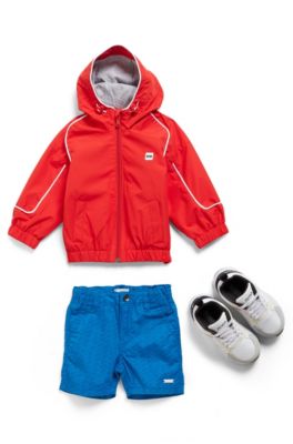 Kids' hooded windbreaker in waterproof fabric with rear logo, Red