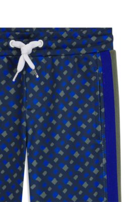 Kids' tracksuit with printed monograms, Dark Blue