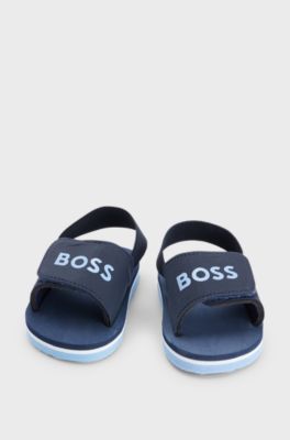 Kids' slides with ankle strap and logo detailing, Dark Blue