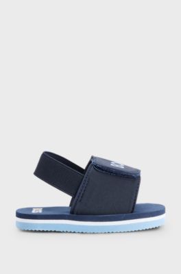 Kids' slides with ankle strap and logo detailing, Dark Blue