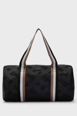 Kids' monogram-pattern holdall with signature-stripe straps, Black