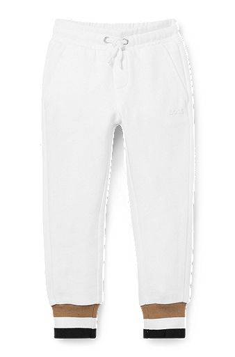 Pantalones de chándal para niños en algodón con rayas de la marca en los puños, Blanco