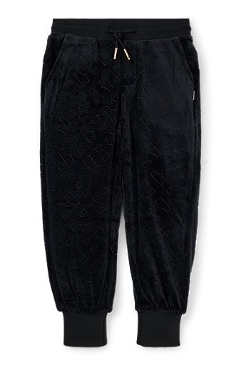 Kids' velvet trousers with embossed monogram detail, Black