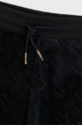 Pantalones de terciopelo para ni&ntilde;os con detalle de monograma grabado, Negro