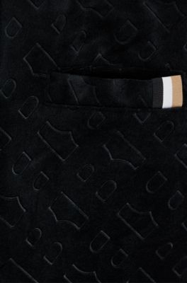 Kids' velvet trousers with embossed monogram detail, Black