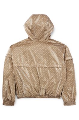 Kids' hooded windbreaker with monogram pattern, Beige