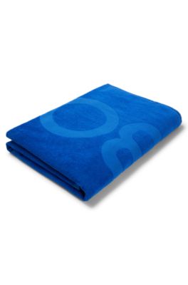 Kids' beach towel in cotton with logo and stripe, Blue