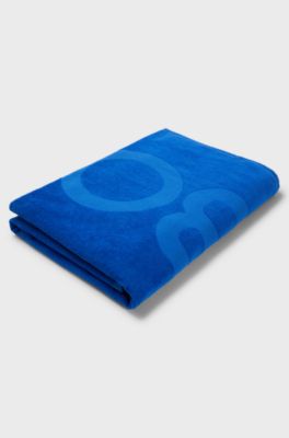 Kids' beach towel in cotton with logo and stripe, Blue