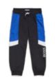Trainingsbroek voor kinderen met color-blocking en logoprints, Zwart