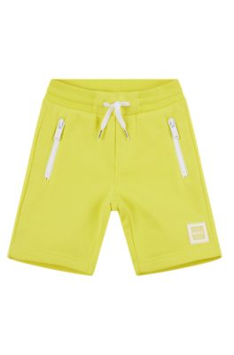 Kids' cotton-blend shorts with zipped pockets, Yellow