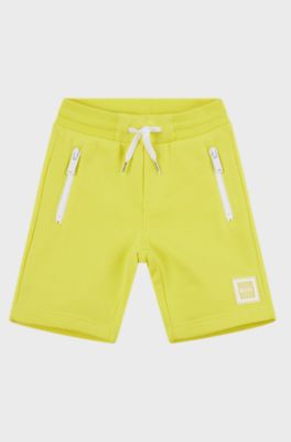 Kids' cotton-blend shorts with zipped pockets, Yellow