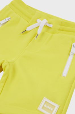 Kids' cotton-blend shorts with zipped pockets, Yellow