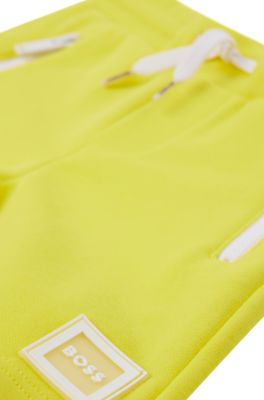 Kids' cotton-blend shorts with zipped pockets, Yellow