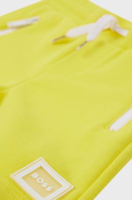 Kids' cotton-blend shorts with zipped pockets, Yellow