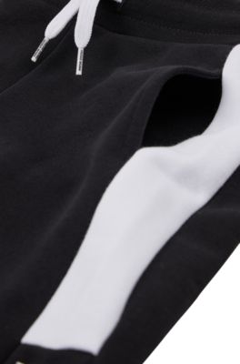 Kids' cotton-blend tracksuit bottoms with logo print, Black