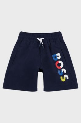 Kids' quick-dry swim shorts with multi-coloured logo, Dark Blue