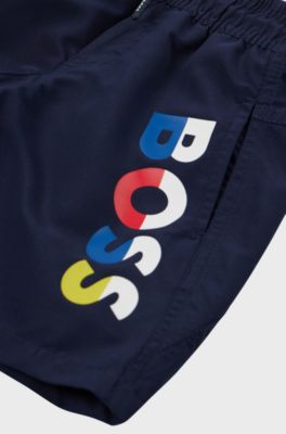 Kids' quick-dry swim shorts with multi-coloured logo, Dark Blue