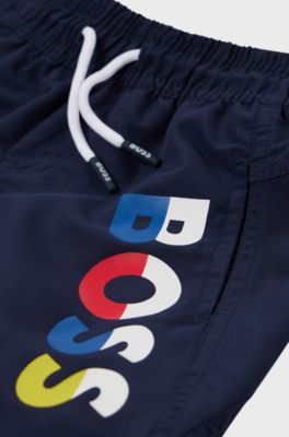 Kids' quick-dry swim shorts with multi-coloured logo, Dark Blue