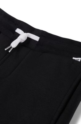 Kids' colour-block tracksuit bottoms with logo print, Black
