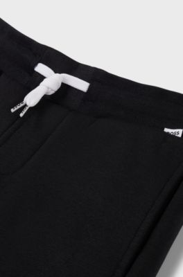 Kids' colour-block tracksuit bottoms with logo print, Black
