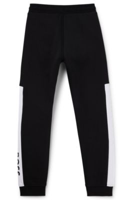 Kids' colour-block tracksuit bottoms with logo print, Black