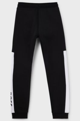 Kids' colour-block tracksuit bottoms with logo print, Black