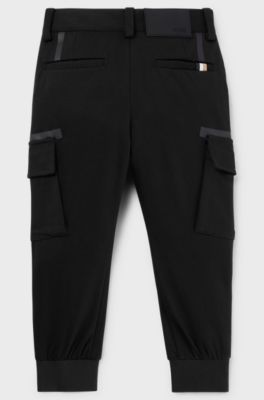 Kids' cargo trousers with zipped hems and striped label, Black
